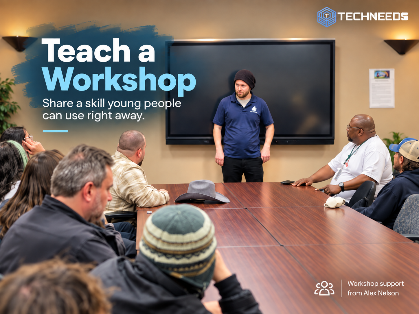 Teach a Workshop. Share a skill young people can use right away. Workshop scene: a presenter leading a discussion with community members around a conference table. Workshop support from Alex Nelson.